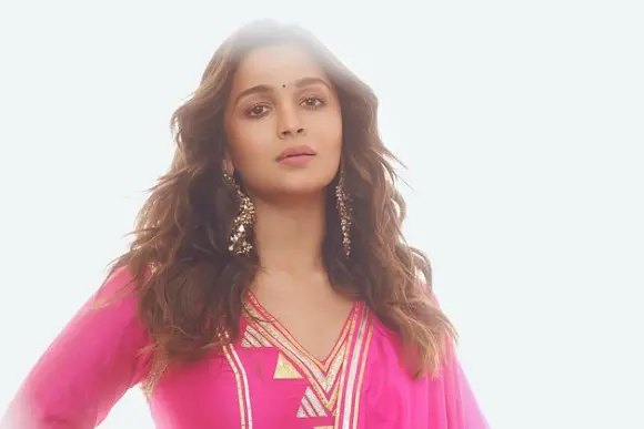 Mom-to-be Alia Bhatt flaunts her pink suit with 'baby on board' special text inscribed on it