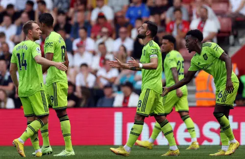 Bruno Fernandes (C) celebrates scoring | AFP