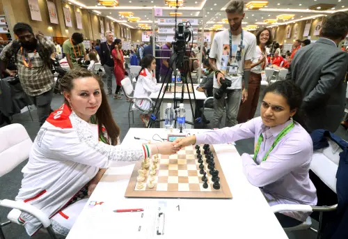 Indian Chess Player Koneru Humpy plays chess with Tajikistan's Antonova at the 44th Chess Olympiad, at Mahabalipuram located on the outskirts of Chennai on Friday | Photo: ANI