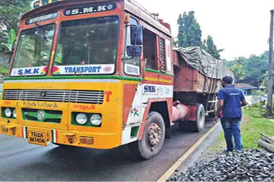 Inebriated driver sleeps parking lorry on middle of road, causes public nuisance