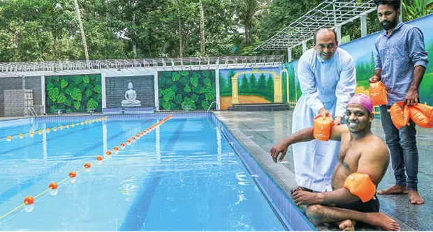 Swimming training for paraplegic persons in Thrissur
