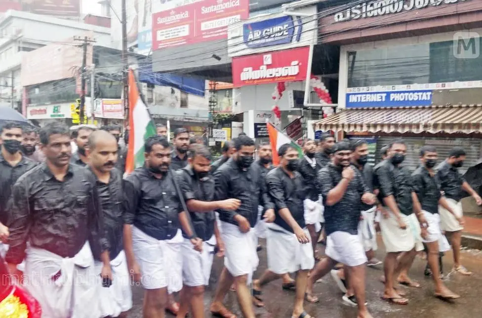 Youth Congress activists wearing black clothes taking part in a protest | Photo: C Sunilkumar