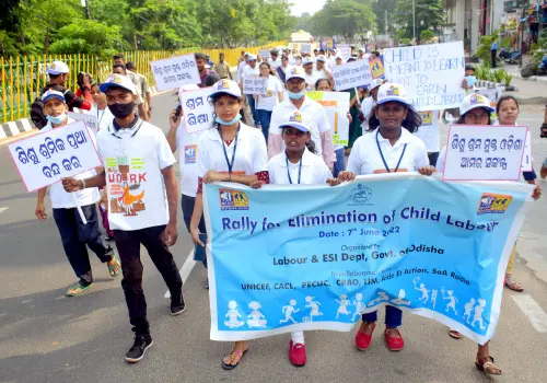 Volunteers participate in a rally organised by the Labour and ESI Department, Odisha Government to eliminate child labour, in Bhubaneswar on Tuesday | Photo: ANI