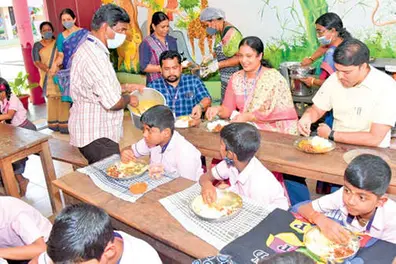 Ernakulam Collector visits school in Thrikkakara, eats meals with students