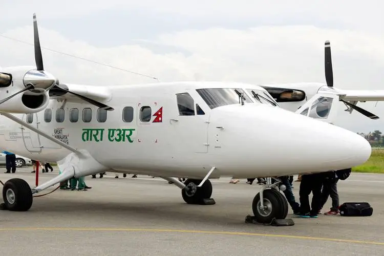 Fate of 4 Indians and 18 others unclear as rescuers locate burnt-out wreckage of missing Nepal plane