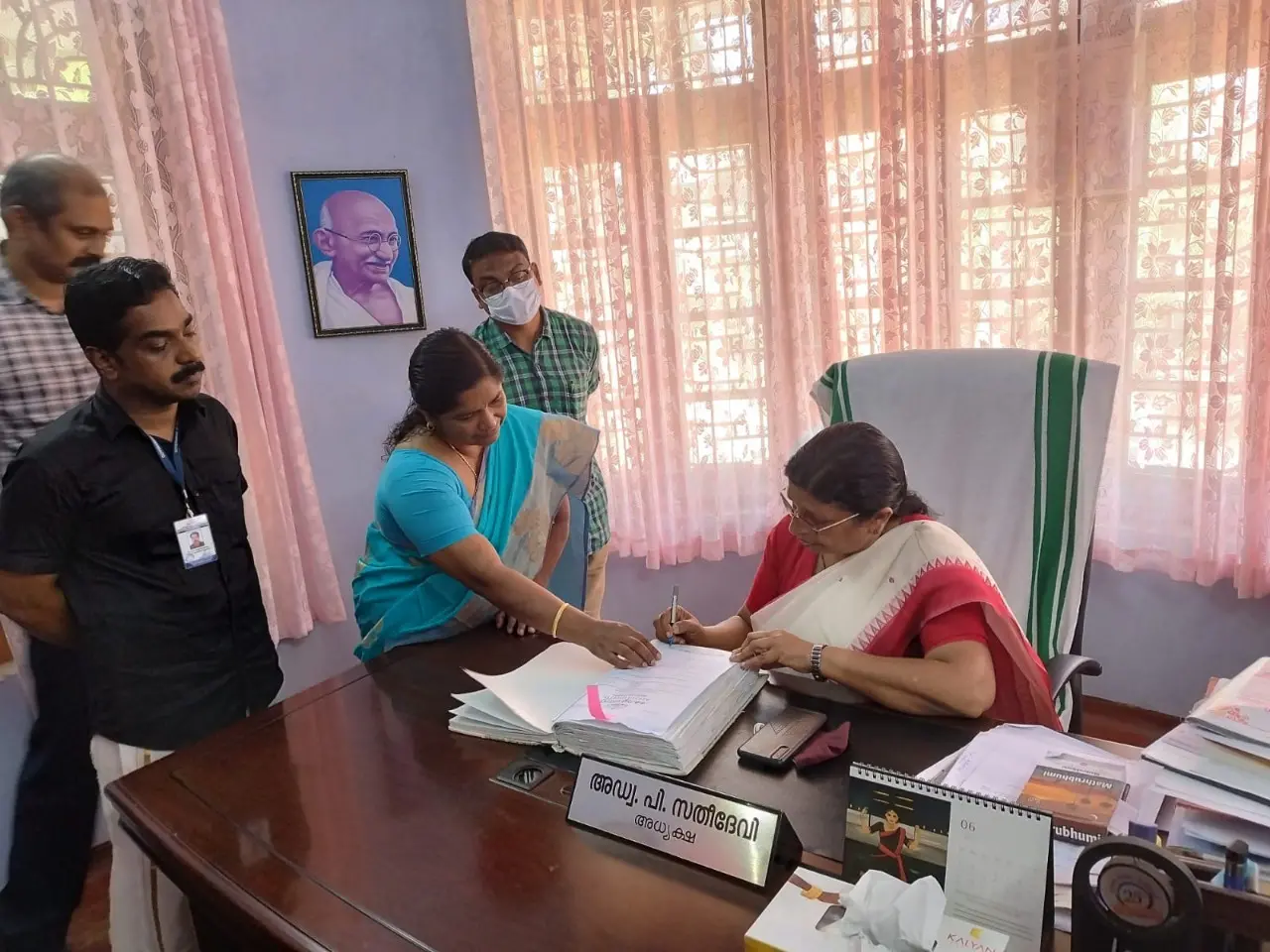 Adv P Sathidevi taking charge as chairperson of the Women's Commission