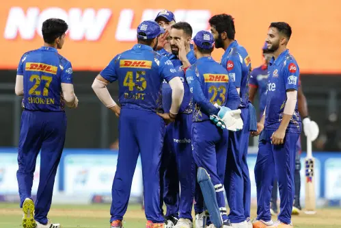 Mumbai denies Delhi IPL playoff berth, advancing Bangalore