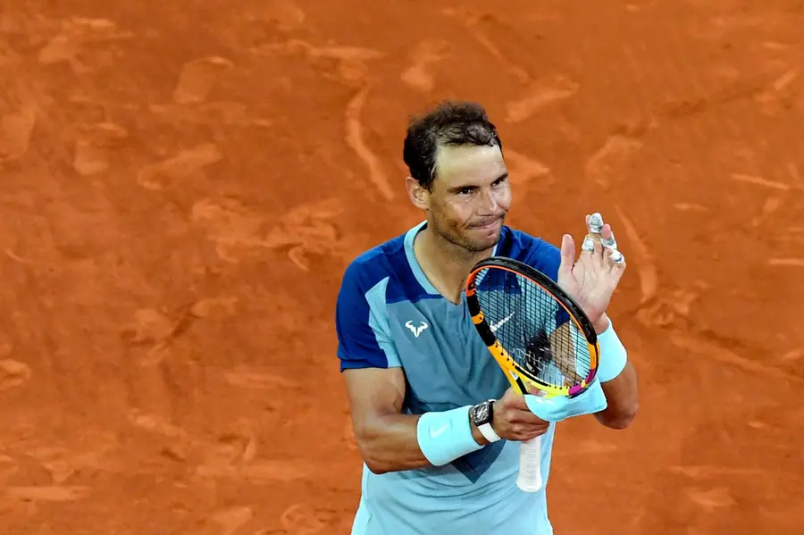 Nadal returns from injury with straight-set win in Madrid