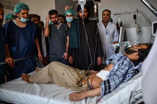 Death toll in Afghan mosque bombing rises to 33, Taliban say