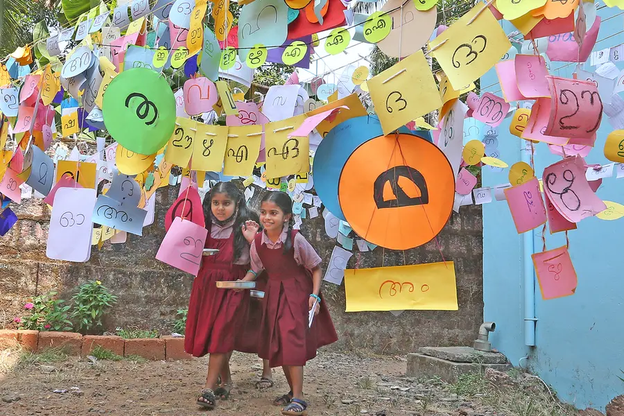 Malayalam returns partially to old script