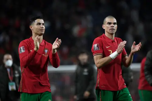 Cristiano Ronaldo (L) and Pepe | AFP
