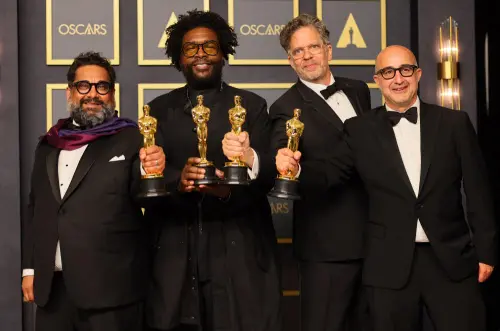 (L-R) Joseph Patel, Ahmir 'Questlove' Thompson, Robert Fyvolent and David Dinerstein, winners of Documentary (Feature) award for 'Summer of Soul (...Or, When the Revolution Could Not Be Televised)' award pose in the press room during the 94th Annual Academy Awards at Hollywood and Highland on March 27, 2022 in Hollywood, California | Photo: AFP