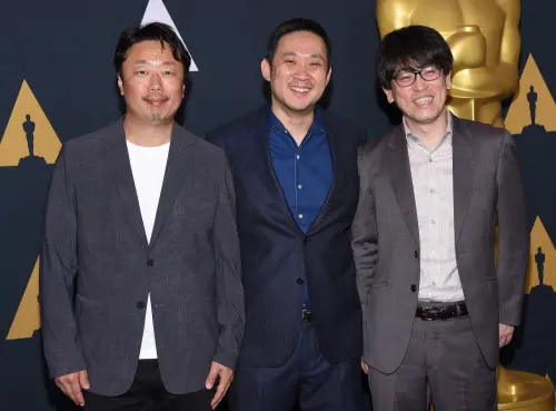 'Drive My Car' producer Teruhisa Yamamoto, Japanese director Ryusuke Hamaguchi and Japanese writer Takamasa Oe attend the 'Oscar Week: International Feature Film' at the Academy of Motion Pictures Theatre in Beverly Hills, California, on March 24, 2022 | Photo: AFP