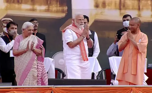 Prime Minister Narendra Modi with BJP leader Yogi Adityanath and Uttar Pradesh Governor Anandiben Patel greets during the swearing-in ceremony, at the Atal Bihari Vajpayee Ekana Cricket Stadium in Lucknow on Friday | Photo: ANI