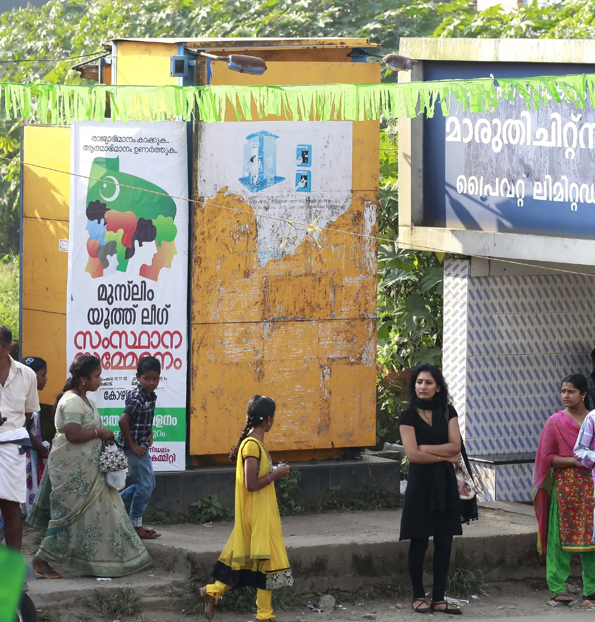 Women waiting in front of a public toilet | Photo: Mathrubhumi