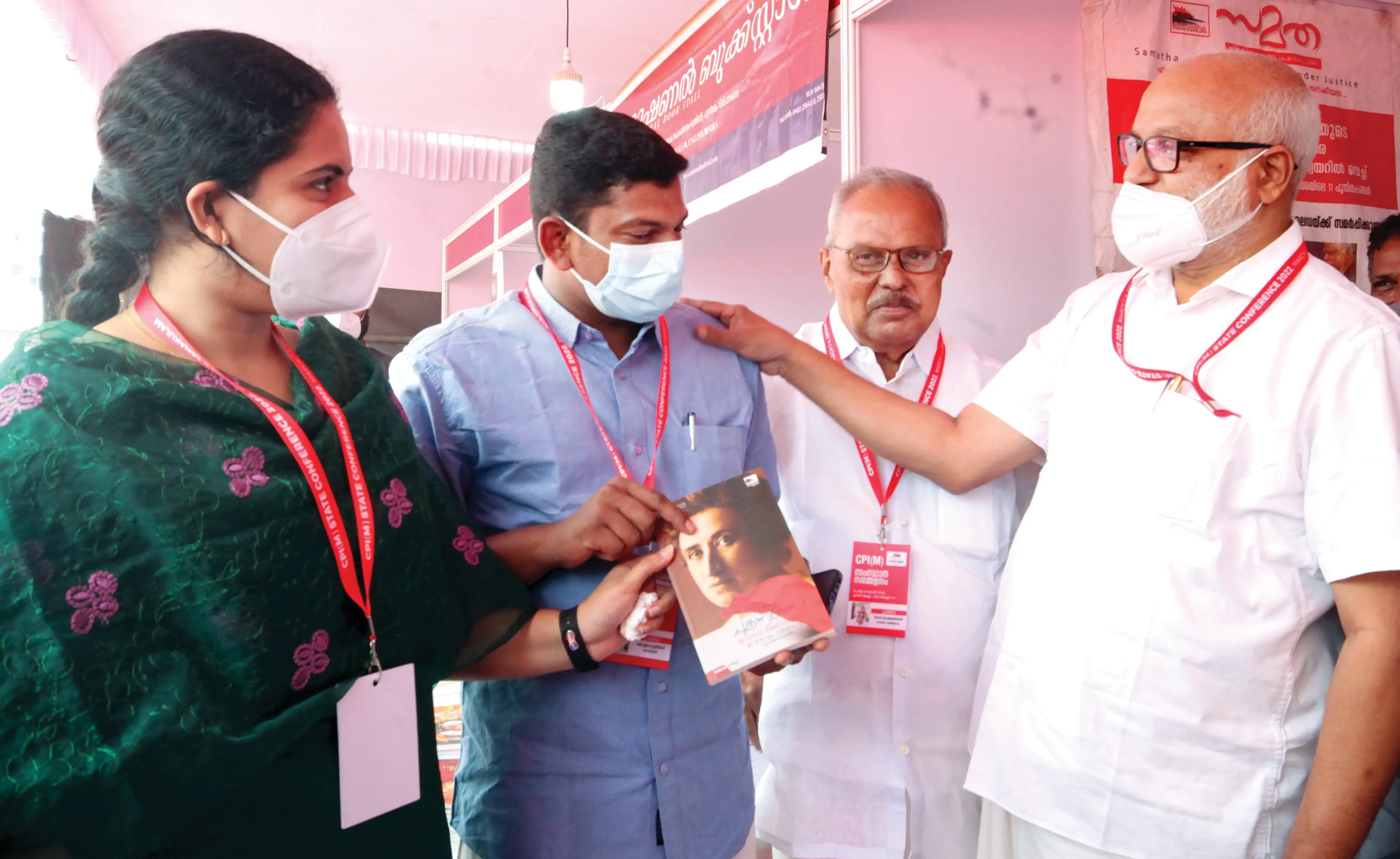 MA Baby gifts book to soon to be wed couple Arya and Sachin at CPM state conference | Photo: VK Aji/Mathrubhumi