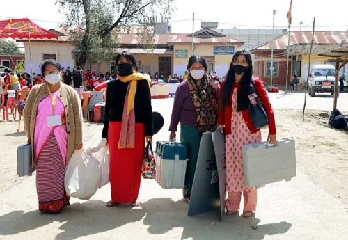 Polling officials carrying Electronic Voting Machines (EVMs) and other polling materials prior to leaving for their respective polling booth on the eve of the first phase of Manipur Assembly elections on Sunday | Photo: ANI