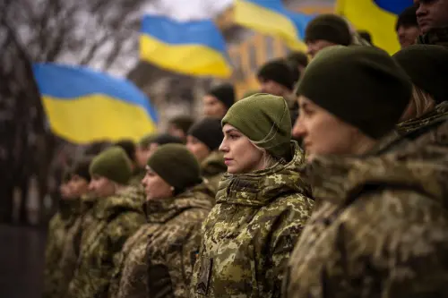 Ukrainian Army soldiers pose for a photo as they gather to celebrate a Day of Unity I AP