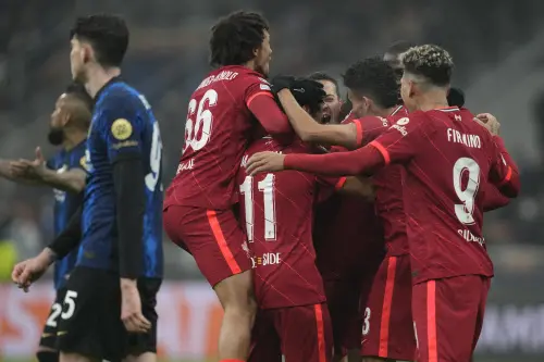 Mohamed Salah celebrates with his teammates after scoring his side's second goal I AP