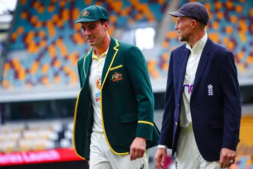 Patrick Cummins (L) and England's captain Joe Root (R) | AFP
