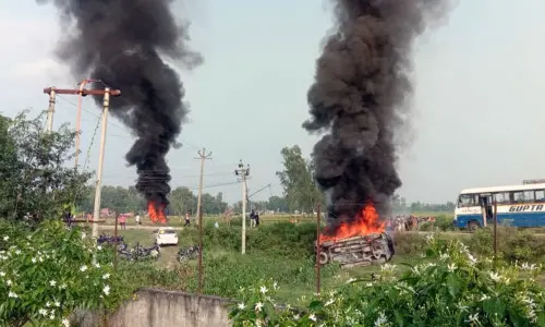 Vehicle set ablaze after violence broke in Lakhimpur Kheri | Photo: ANI