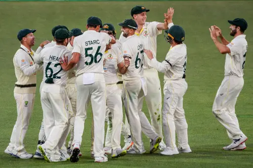 Australian players celebrate their victory against England | AFP
