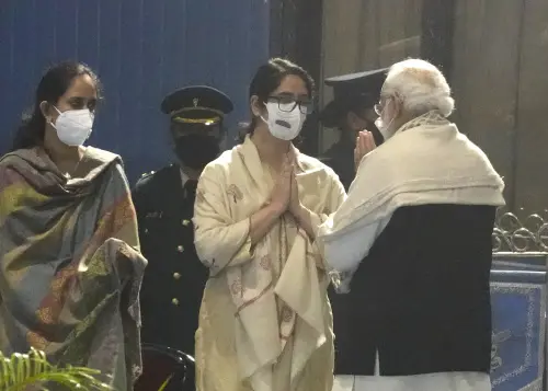 Prime Minister Narendra Modi, right, consoles daughters of Chief of Defence Staff of the Indian Armed forces Bipin Rawat during a homage ceremony to the victims of the helicopter crash at Palam airport in New Delhi, India, Thursday | Photo: AP