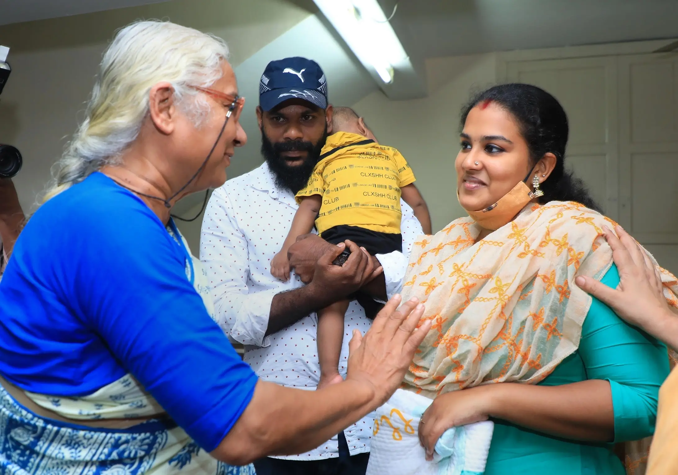 Social activist Medha Patkar with Anupama and Ajit, a couple that fought for the custody of their child who was allegedly illegally put up for adoption by state government agencies, in Thiruvananthapuram, Saturday