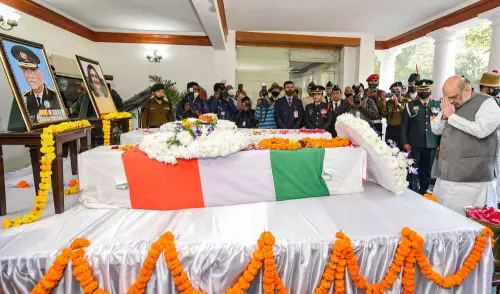 Union Home Minister Amit Shah pays tribute to CDS Gen Bipin Rawat, who passed away in an IAF chopper crash near Coonoor in Tamil Nadu on Wednesday, at his residence in New Delhi, Friday, Dec. 10, 2021. PTI Photo