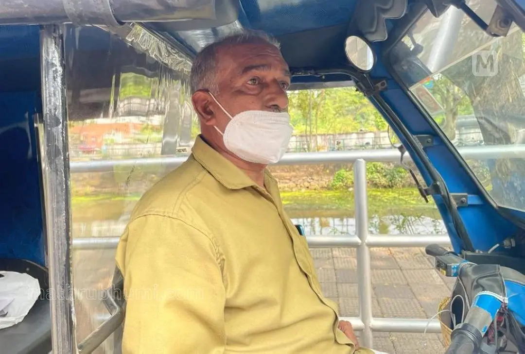 Electric autorickshaw driver Devanandan