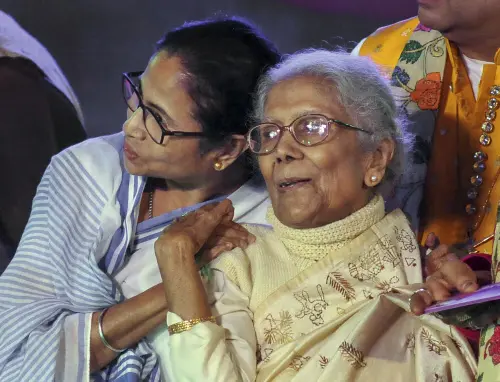 West Bengal Chief Minister Mamata Banerjee with legendary singer Sandhya Mukherjee during the inuaguration of "Bangla Sangeet Mela-2019", in Kolkata, Wednesday, Dec. 4, 2019. (PTI Photo)