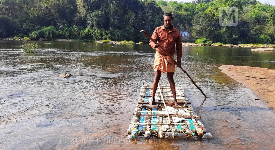 Asokan on his raft | Photo: Mathrubhumi