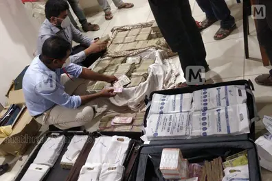 Dramatic events during I-T raid at Believers Church; priest tries to destroy iPhone
