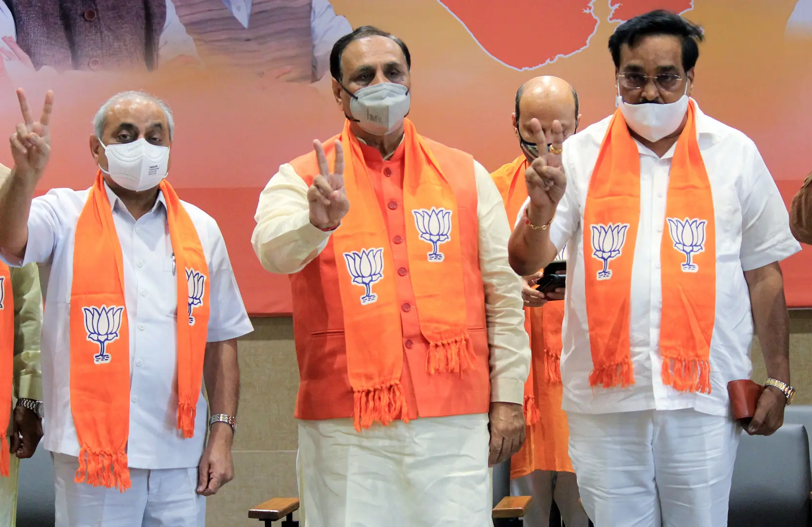 Vijay Rupani (C), Gujarat BJP president CR Patil (R), and Deputy Chief minister Nitin Patel | File photo: ANI