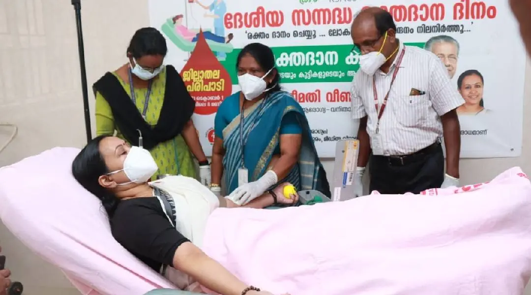 Health Minister Veena George donating blood at Thycaud hospital