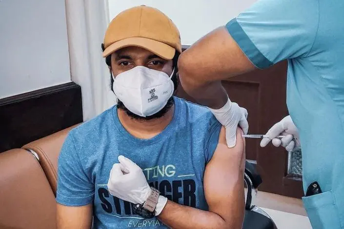 Neeraj Madhav takes COVID vaccine, urges all to trust the process