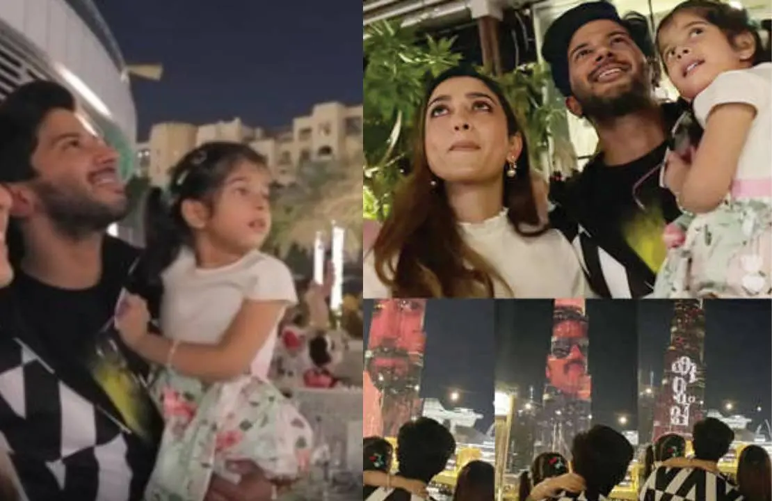 Dulquer Salmaan and family watching 'Kurup' trailer in front of Burj Khalifa