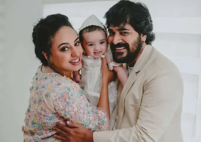 Pearle with baby and husband | Photo: Instagram|life_of_colours_|