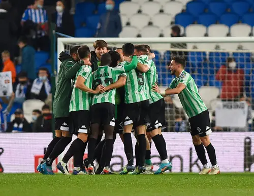 Real Betis' players celebrate their victory | AFP