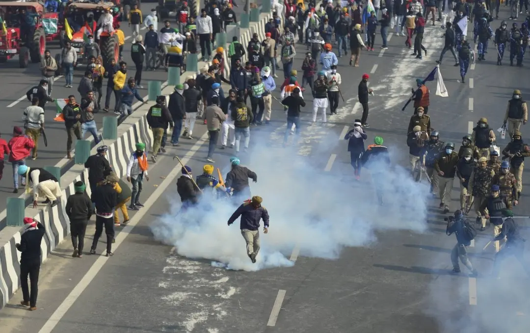 Police using tear gas against protesters | Photo: PTI