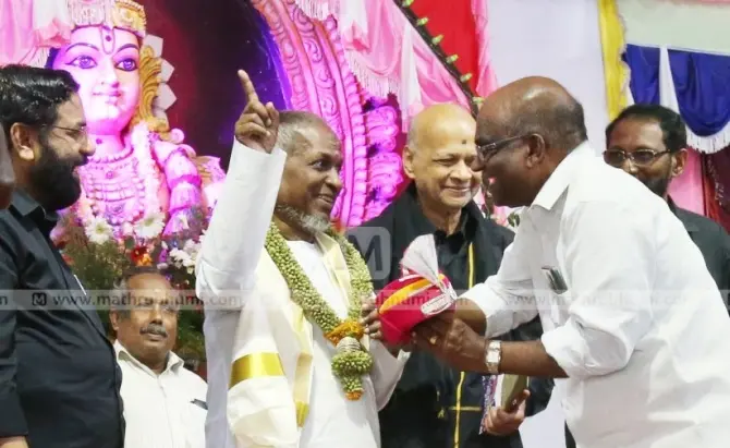 Illaiyaraja along with minister Kadakampally Surendran and Devaswom Board president N Vasu at the award function. Photo: C Sunilkumar