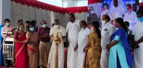 John Fernandez MLA lighting the lamp during the inauguration event of Chellanam fishing harbour