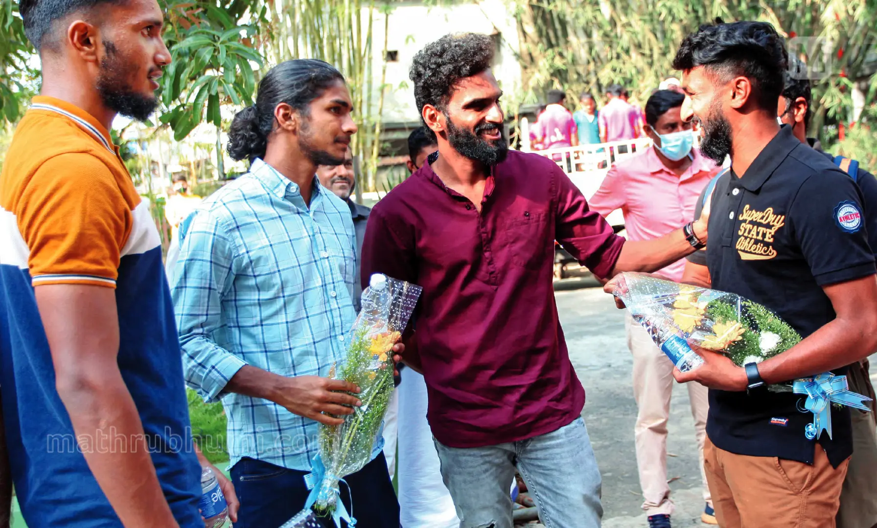 Footballer CK Vineeth with Gokulam FC players Muhammed Rashid, Emil Benny and Alex Saji