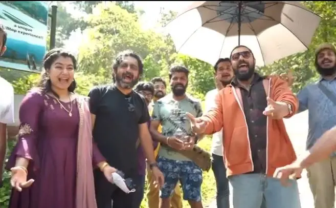 Nivin Pauly and Grace Antony with crew members at the set of 'Kanakam Kamini Kalaham' | Photo: Instagram| nivinpaulyactor|