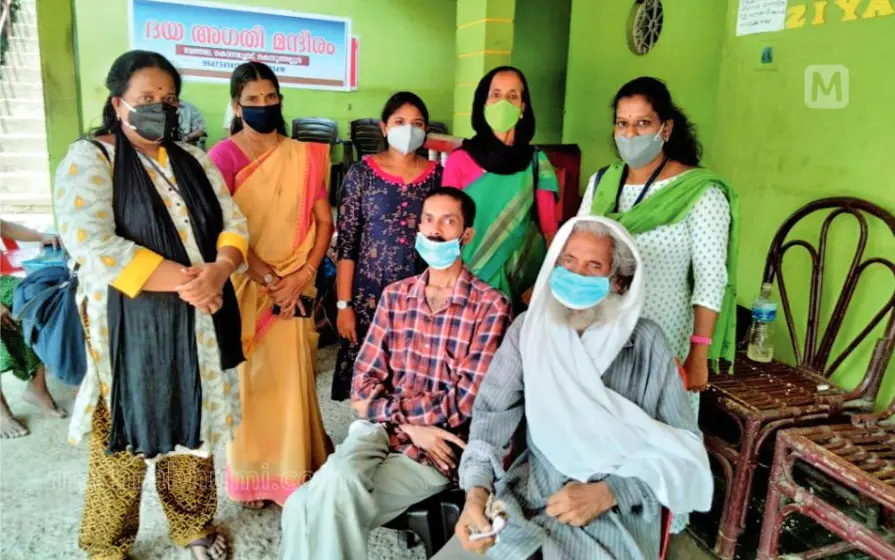 Muhammed and Unais with panchayat authorities