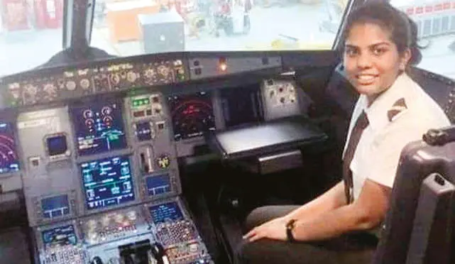 Jeny Jerome in the cockpit of flight