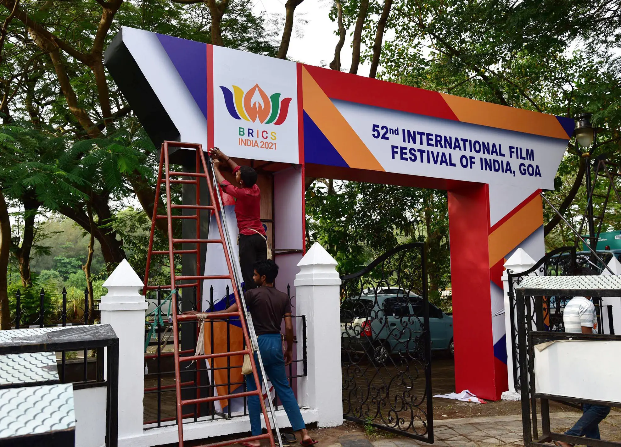 Workers busy in Preparations for 52nd edition of the International Film Festival of India (IFFI-2021), in Panaji on Thursday. Photo: ANI