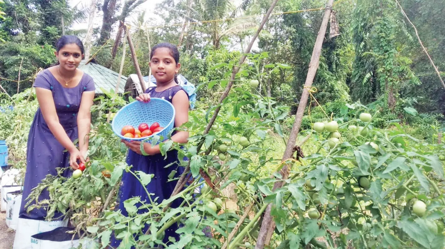 Gopika and Devika in their farm