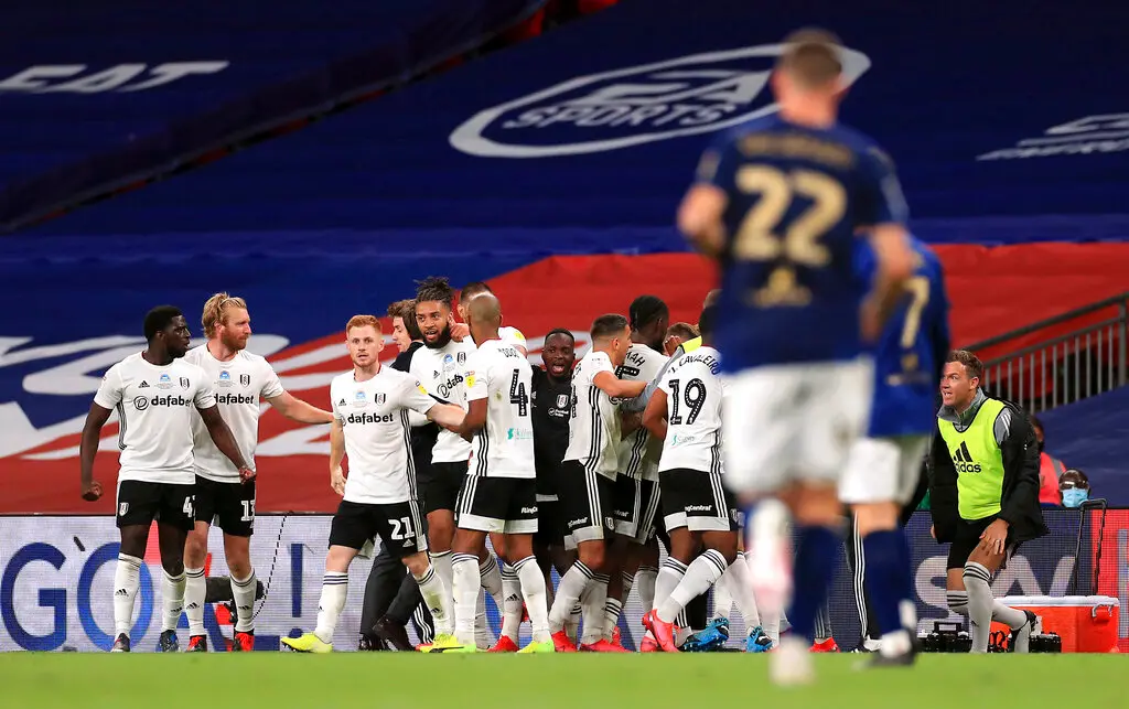 Fulham players celebrate after beating Brentford (AP photo)