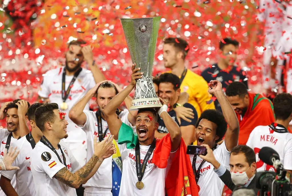Sevilla players celebrate winning the Europa League (AP photo)